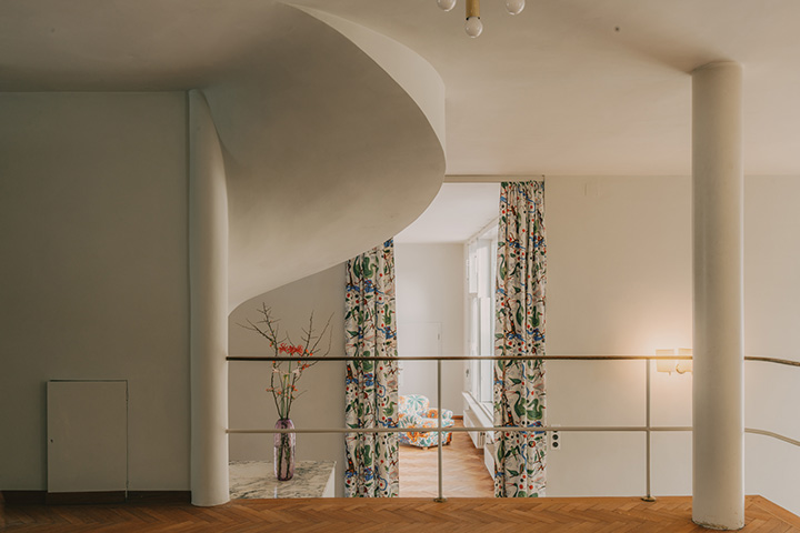 View from the music room through the staircase into the living room